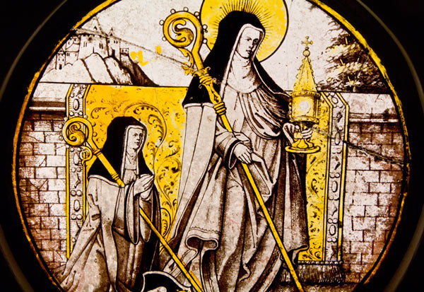 photo of stained glass window featuring saint clare